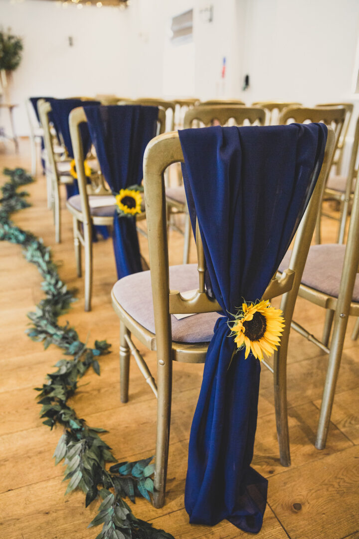 Wedding Ceremony Decor Greenery Swag Sunflowers Becky Bailey Photographer