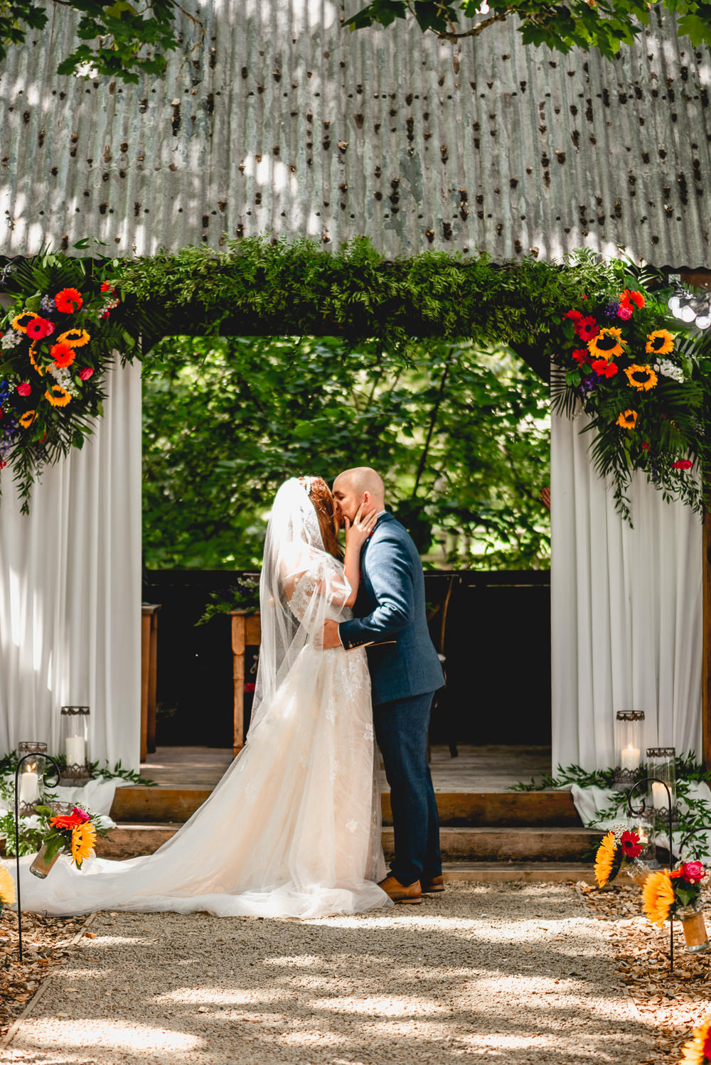 Ceremony Outdoors Backdrop flowers Woodlands Hothorpe Wedding Lisa Carpenter Photography