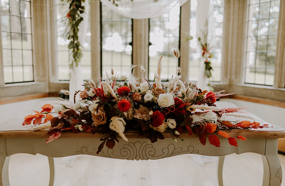 Ceremony Table Flowers Burnt Orange Wedding Sian Hall Photography