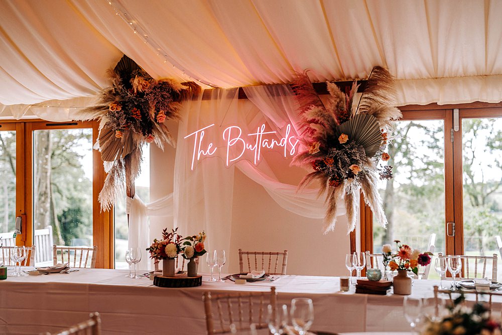 Top Table Backdrop Neon Sign Dried Flowers Tredudwell Manor Wedding Dan Ward Photography