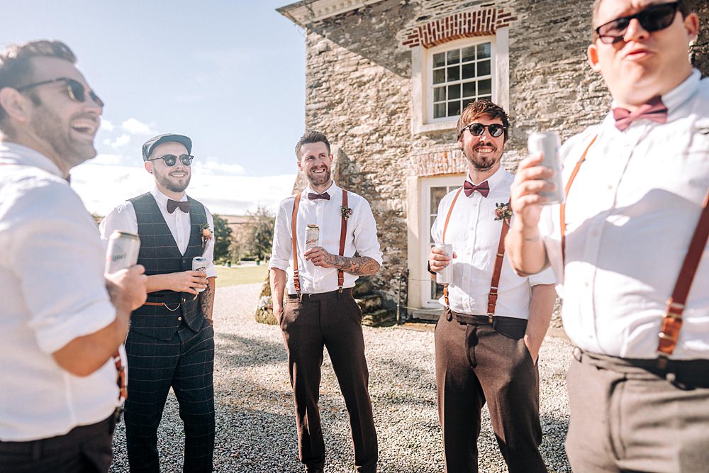 Groom Flat Cap Bow Tie Waistcoat Groomsmen Braces Bow Ties Tredudwell Manor Wedding Dan Ward Photography
