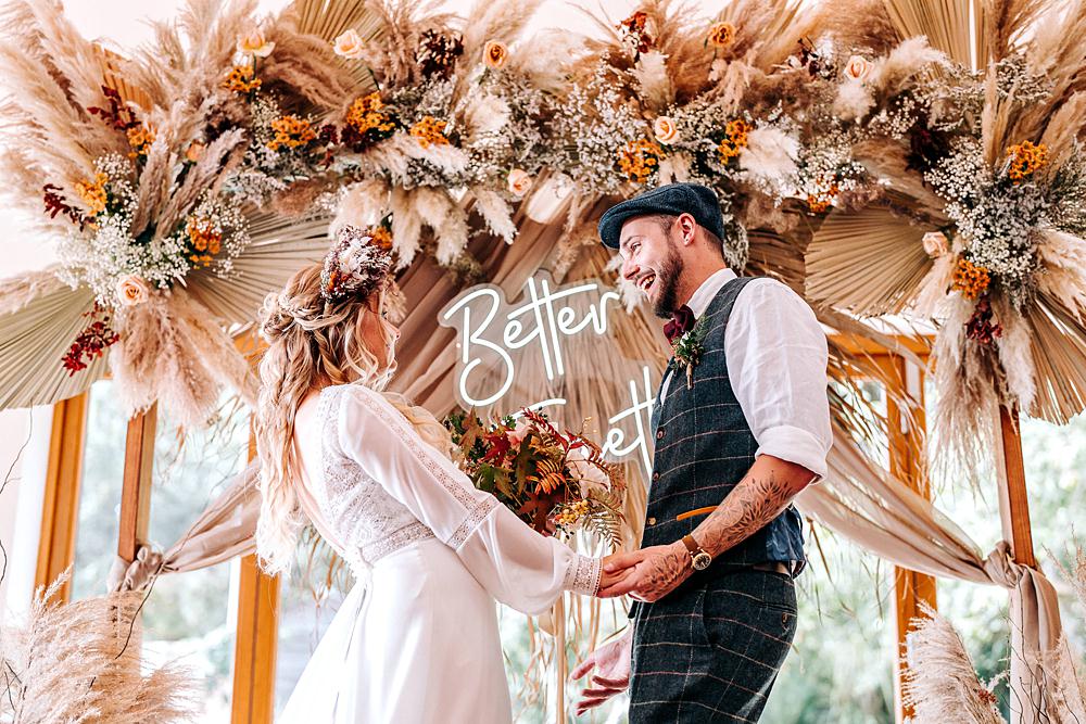 Tredudwell Manor Wedding Dan Ward Photography Backdrop Neon Sign Dried Flowers Ceremony