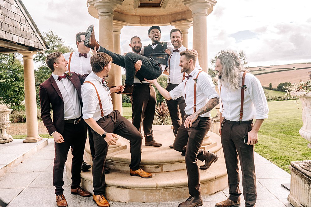 Groom Flat Cap Bow Tie Waistcoat Groomsmen Braces Bow Ties Tredudwell Manor Wedding Dan Ward Photography