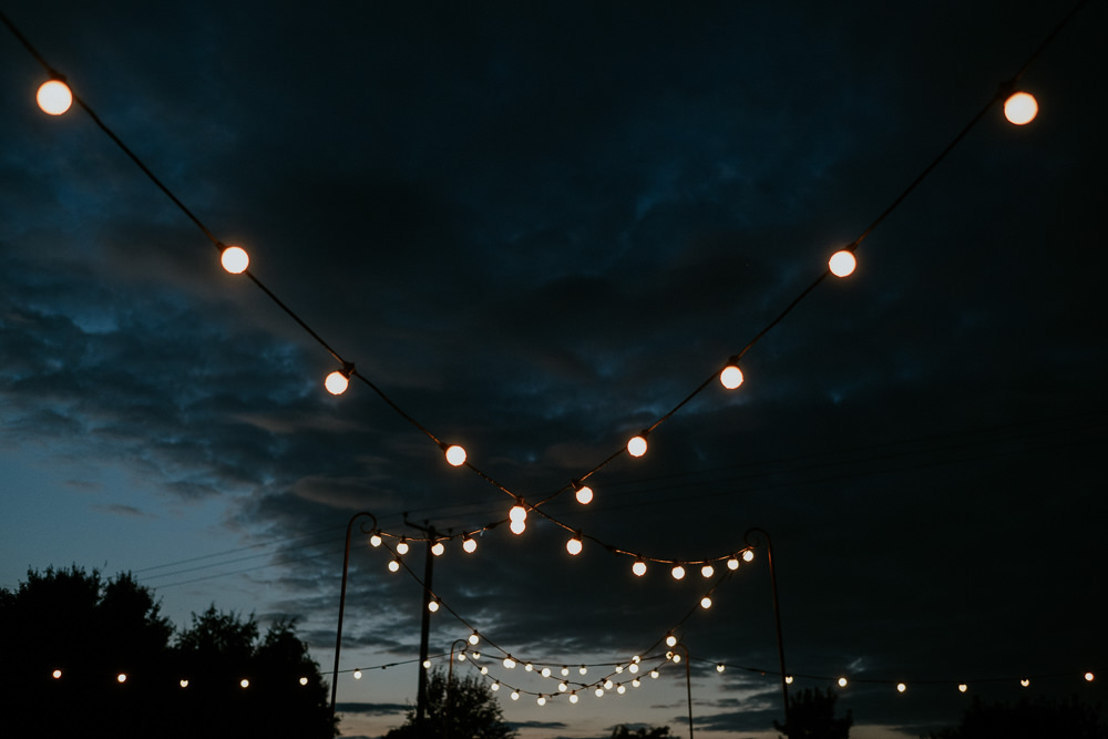 Tipi Festoon Lights Fun Community Wedding Joanna Nicole Photography