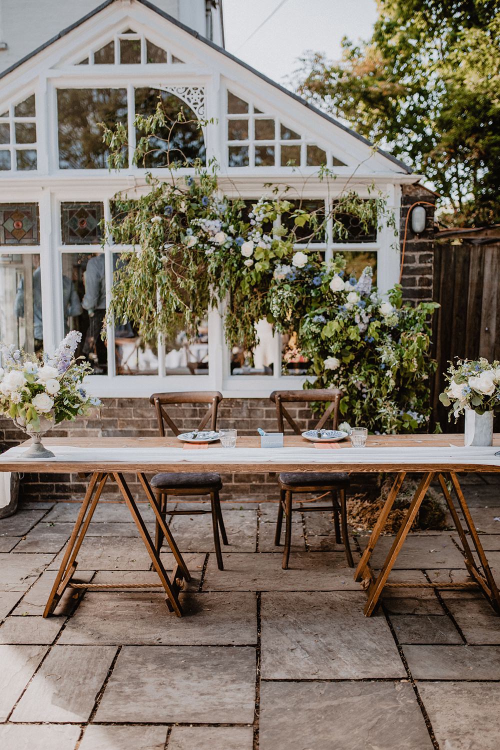 Flowers Greenery Nigella Rose Blue White Backdrop Georgian Townhouse Wedding Camilla Andrea Photography