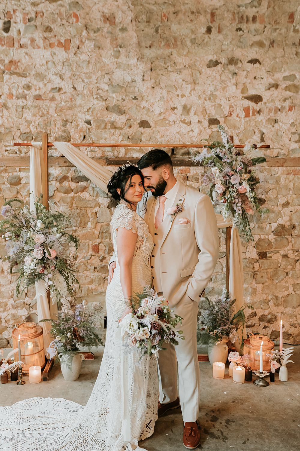 Beige Barn Boho Wedding Gabrielas Photography and Film Backdrop Arch Flowers Drapes Candles
