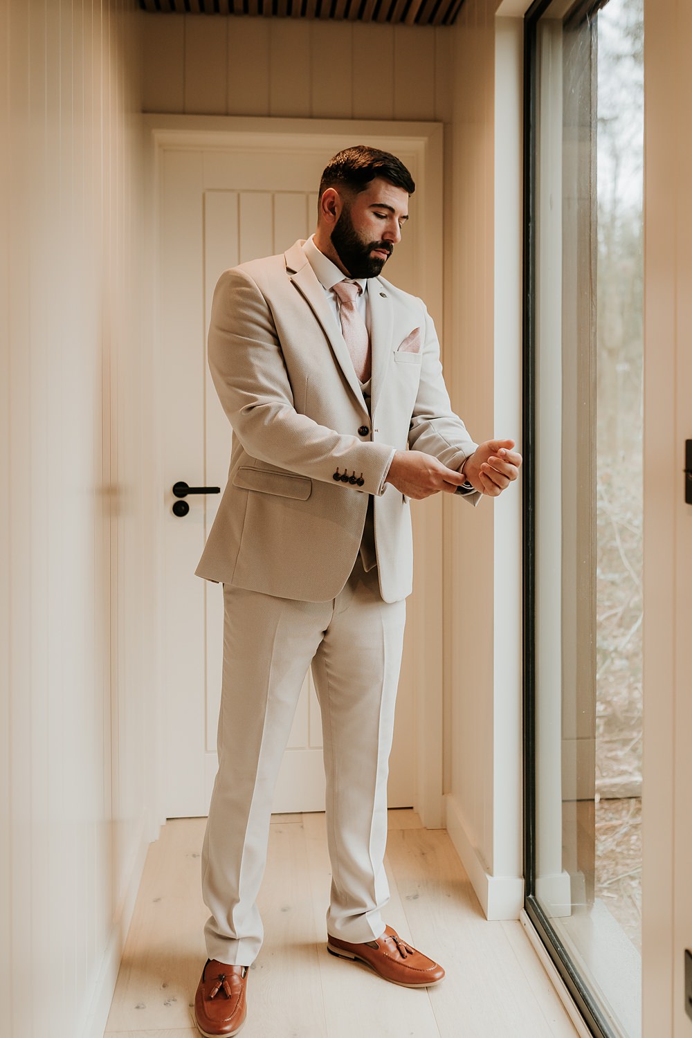 Groom Suit Pink Tie Pocket Square Beige Barn Boho Wedding Gabrielas Photography and Film