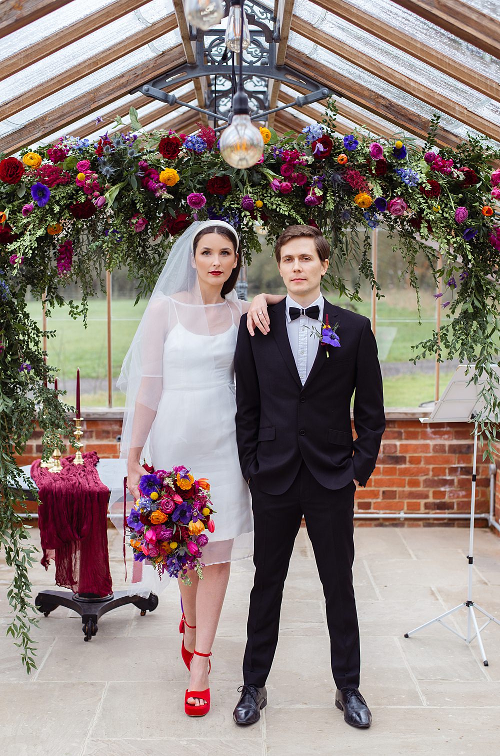 Somersbury Barn Wedding Prime Photography Flower Arch Colourful