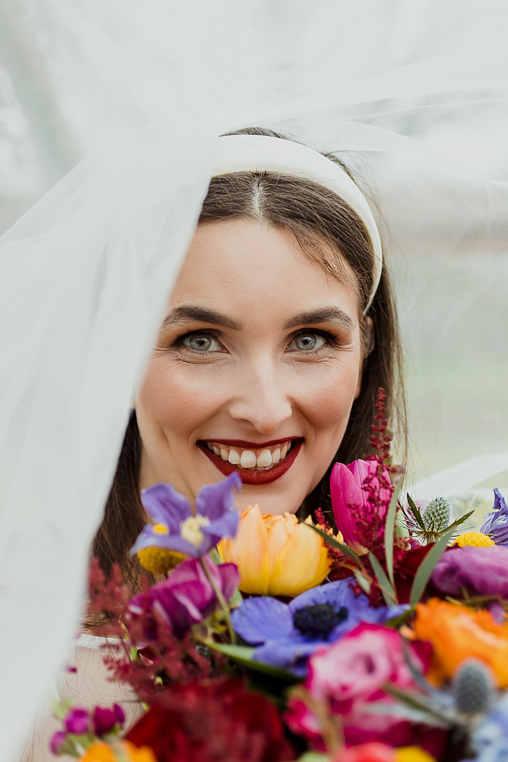 Somersbury Barn Wedding Thorn and Found Bride Makeup Red Lip Smokey Eye