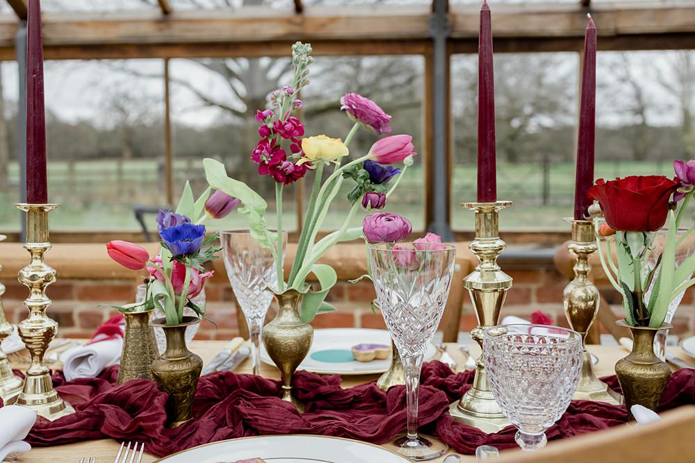 Somersbury Barn Wedding Tyler Rook Photography Flowers Candles Table Decor Green Red Purple Blue Gold