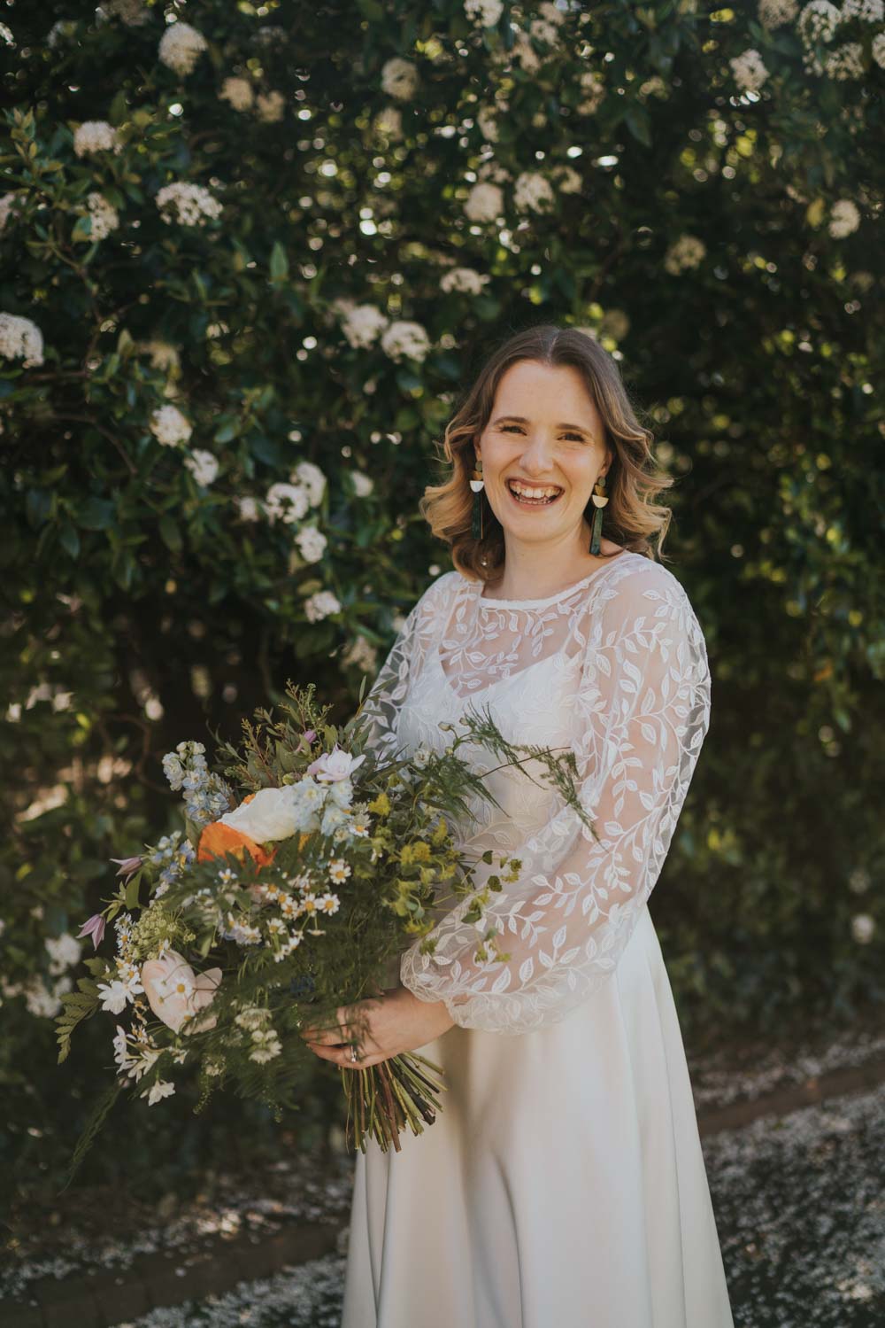 Spring Vintage 70s Inspired Boho Wedding In Green Tones