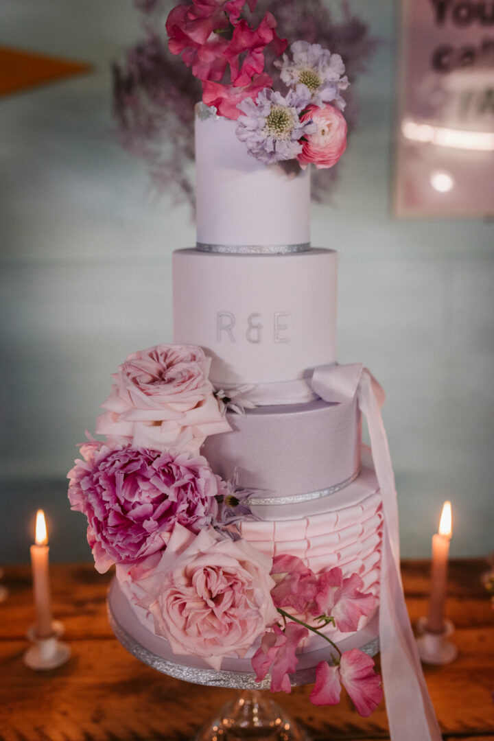 Vintage Wedding Cake Ruffles Ribbon Pink Purple Hannah Brooke Photography