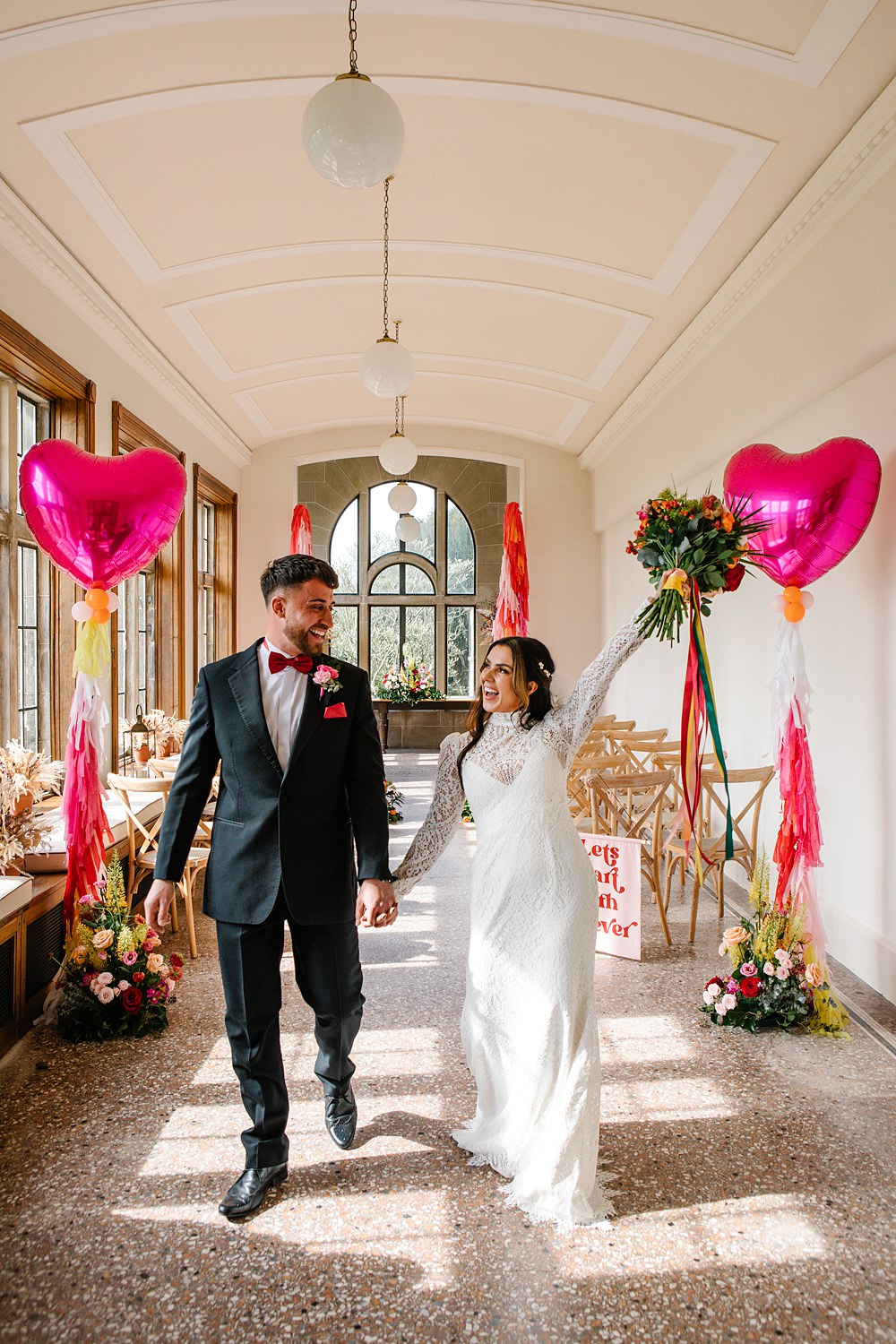 Aisle Heart Balloons Tassels Streamers Cermony Flowers Colour Clash Wedding Ideas Victoria Sponge Photography