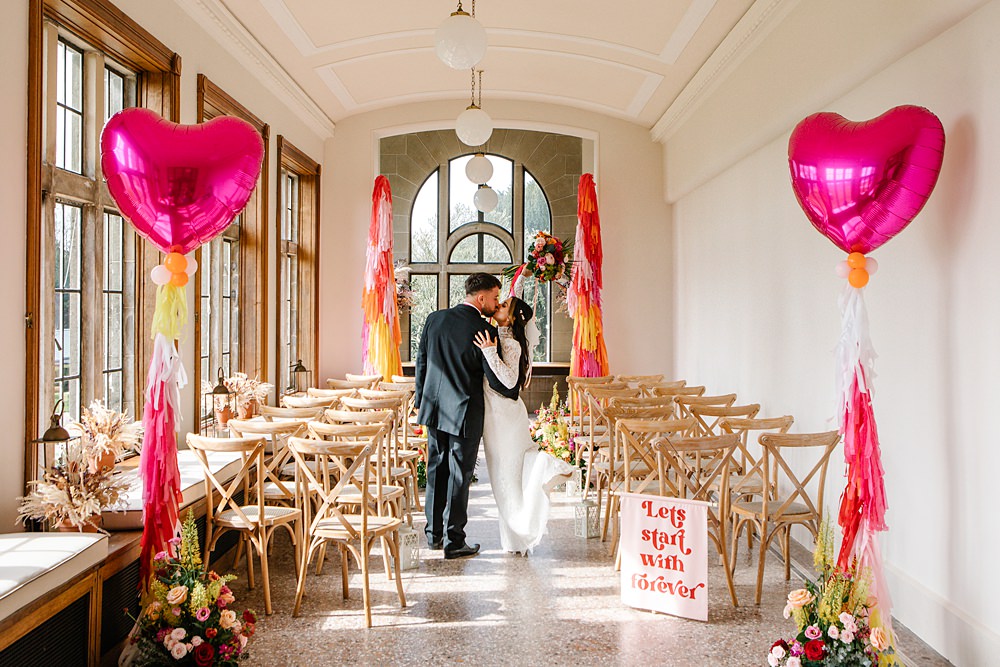 Aisle Heart Balloons Tassels Streamers Cermony Flower Colour Clash Wedding Ideas Victoria Sponge Photography