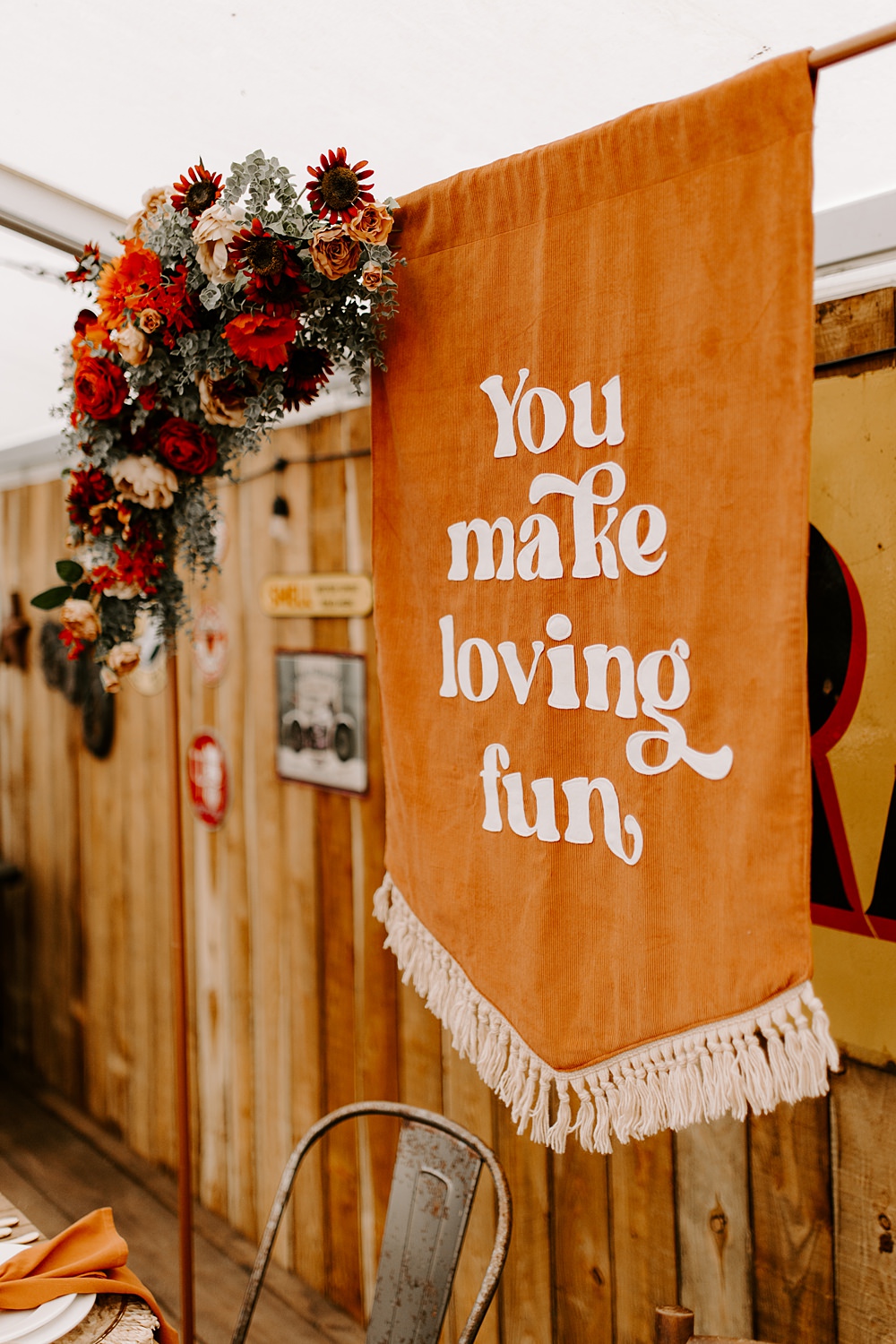 Orange Table Decor Banner Sign Boho Retro 70s Daisy Jones Six Wedding Ideas Caroline Opacic Photography