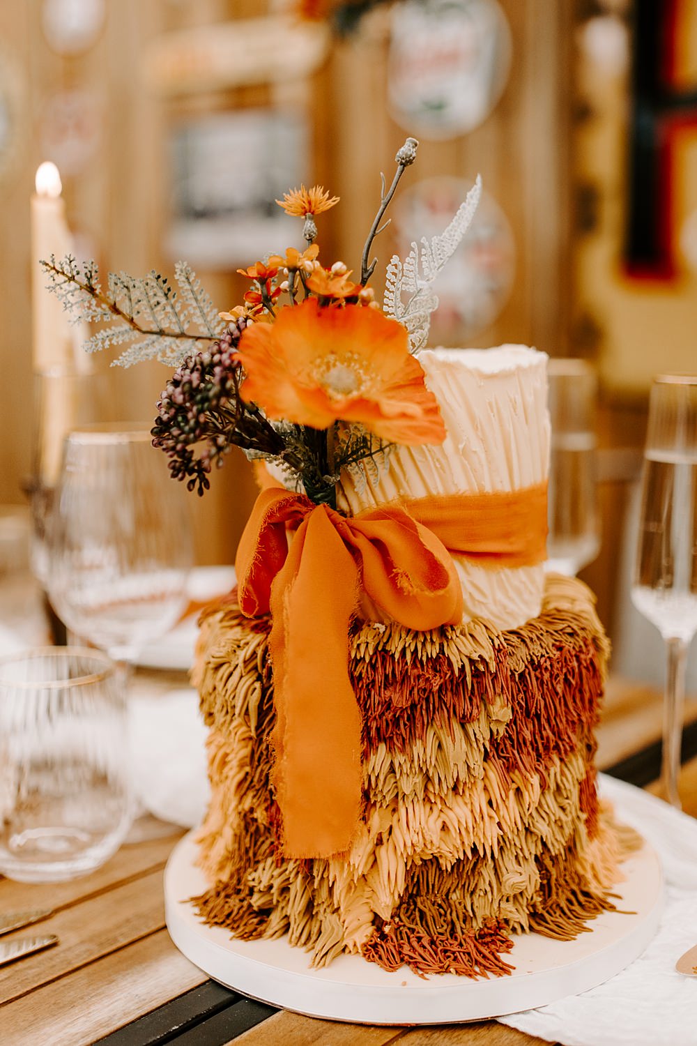 Shag Texture Cake Orange 70s Retro Ribbon Flowers Daisy Jones Six Wedding Ideas Caroline Opacic Photography