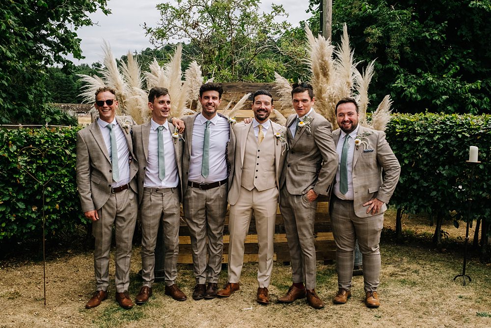 Groom Cream Suit Tie Groomsmen Green Yellow Wedding Kristian Leven Photography