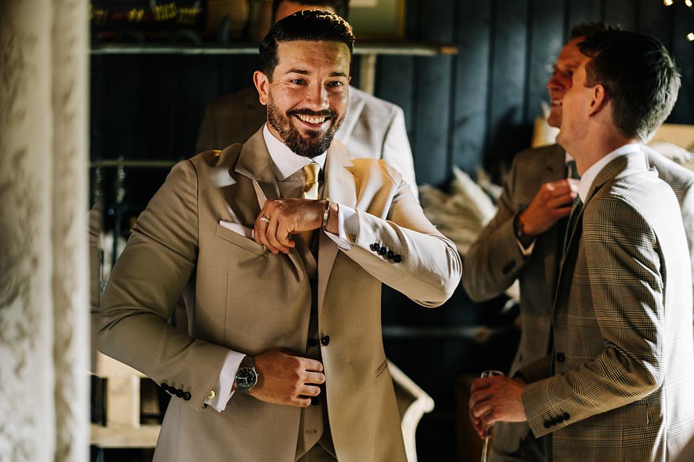 Groom Cream Suit Tie Green Yellow Wedding Kristian Leven Photography