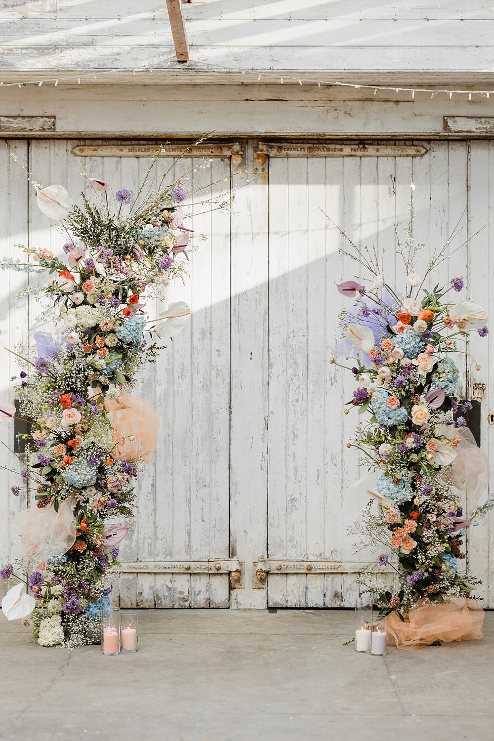 Flower Pillars Arch Backdrop Peach Modern Lilac Wedding Ideas Michelle Huggleston Photography