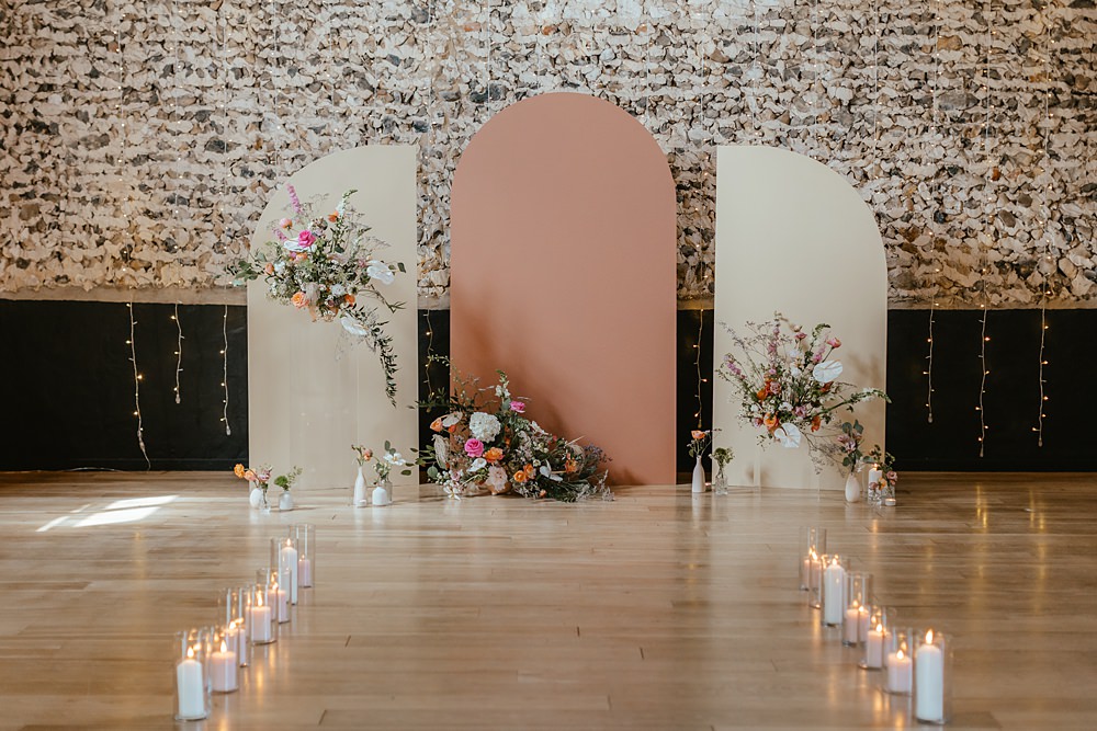 Curve Ceremony Backdrop Flowers Aisle Candles Pink Orange Wedding Ideas Bethany Smith Photography