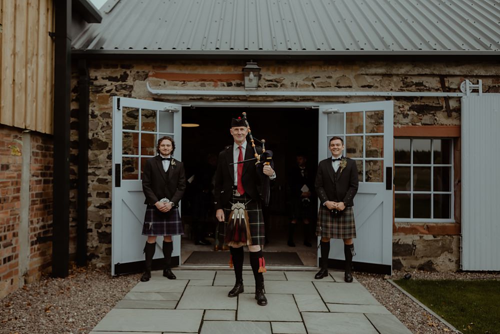 Bagpipe Player Rossie on the Earn Wedding Mint and Jasmine