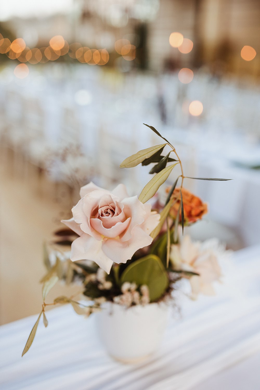 White Vase Table Flower Centrepice Broughton Sanctuary Wedding Photography34