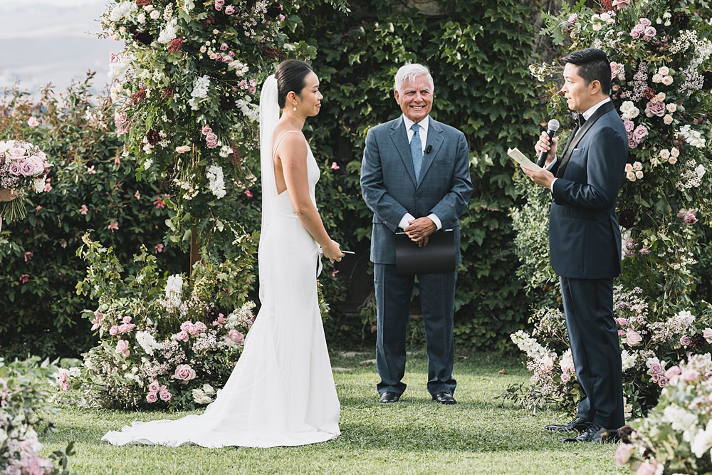 Outdoor Ceremony Flower Pillars Borgo di Castelvecchio Wedding Punti di Bianco