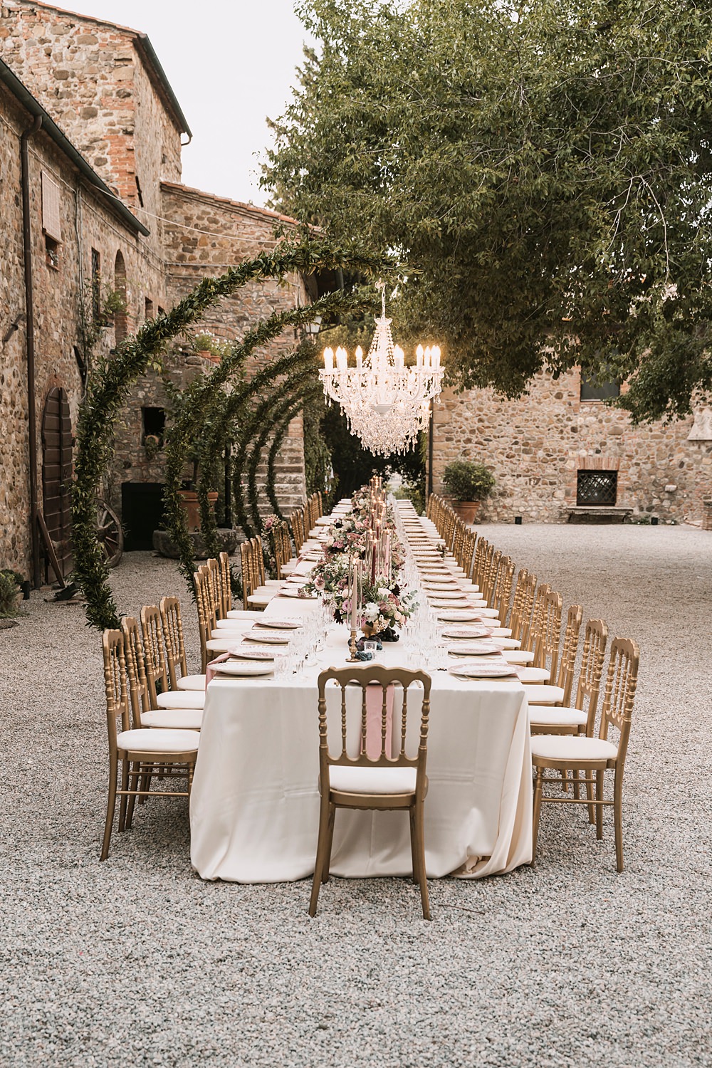 Long Table Outdoor Reception Chandelier Borgo di Castelvecchio Wedding Punti di Bianco