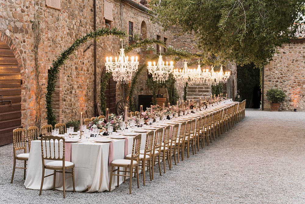 Long Table Outdoor Reception Chandelier Borgo di Castelvecchio Wedding Punti di Bianco