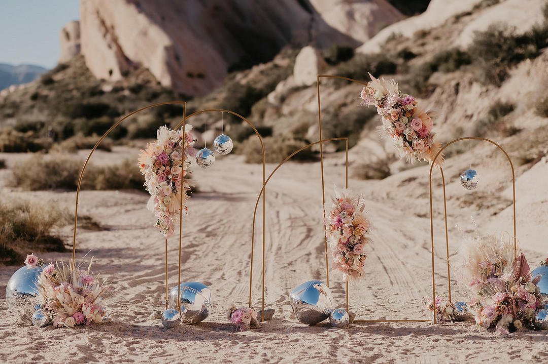 Backdrop Frame Flowers Desert Disco Wedding J. Emmanuel Photography