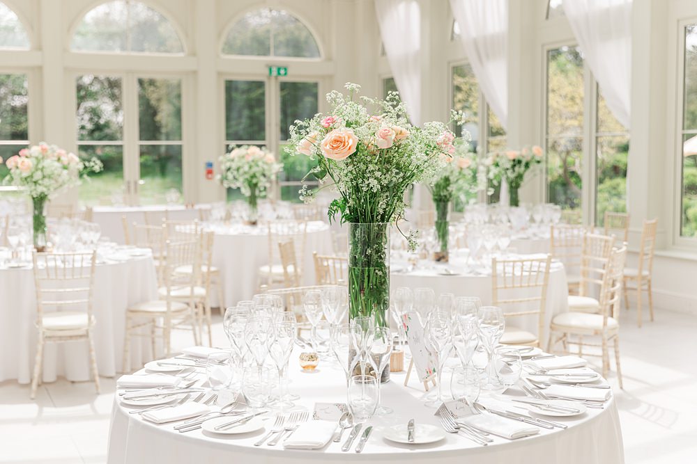 Centrepiece Vase Flowers Coral Rose Round Table English South African Wedding James and Kerrie Photography