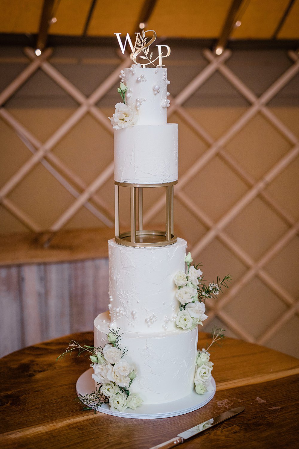 4 Tier White Cake Flowers Invisible Tier Walled Garden Yurt Wedding Charlotte Mail Photography