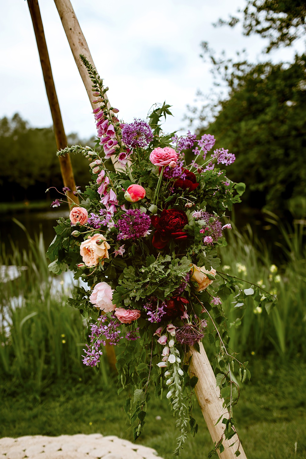 Flower Arch Purple Pink Orange Barnfield Wedding Sonder Lust Photography