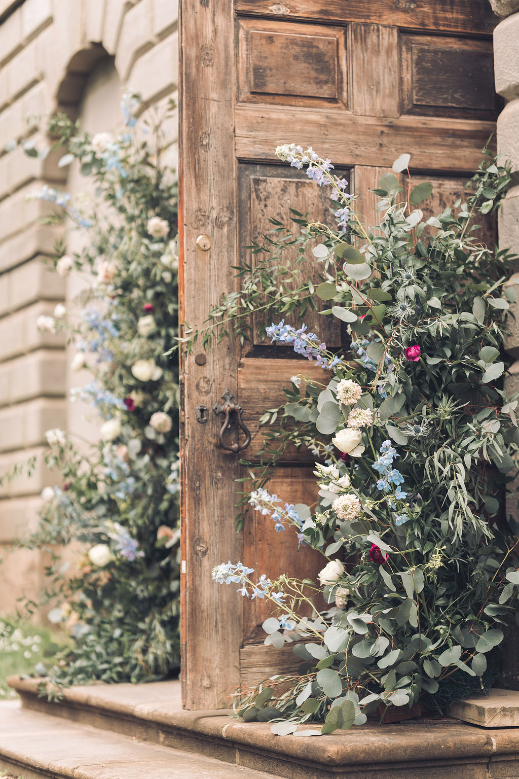 Door Flowers Pillars Arrangements Wild Greenery Backdrop Compton Verney Wedding Story Ellie Mac Photography