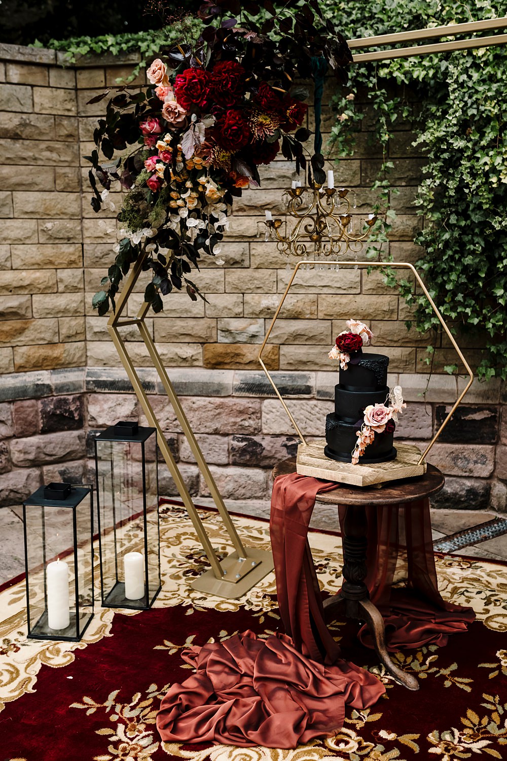 Cake Stand Backdrop Gold Hexagon Red Black Flowers Candles Dunwood Hall Estate Wedding Amy Faith Photography