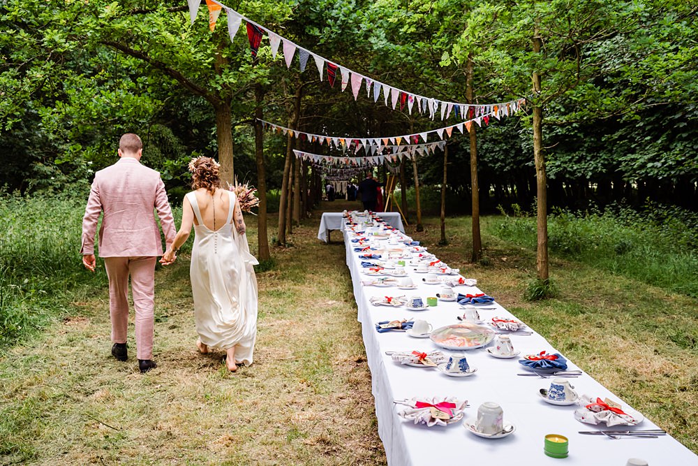 Off Grid Woodland Wedding Purple Kite Photography Bunting Table Reception Woods Forest Decor
