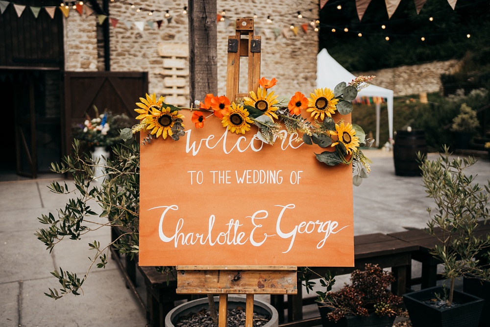 Pagoda Wedding Ceremony Holly Collings Photography Wooden Welcome Sign Flowers