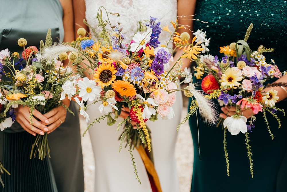 Bouquet Flowers Bride Bridesmaid Colourful Sunflower Pagoda Wedding Ceremony Holly Collings Photography