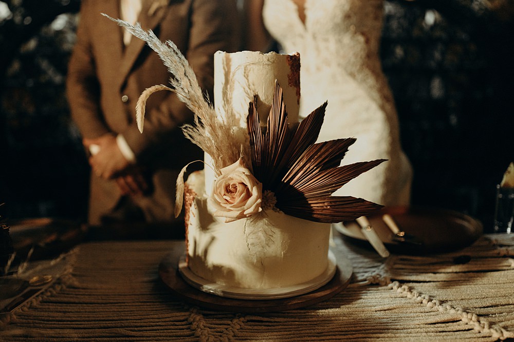 2 Tier Cream Cake Flowers Palm Leaf Villa La Joya Wedding Andre Gouin Photography