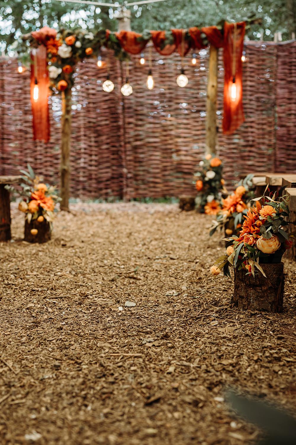 Ceremony Aisle Decor Flowers Log Drapes Backdrop Lights Cockley Woodland Weddings Don’t Delete The Kisses
