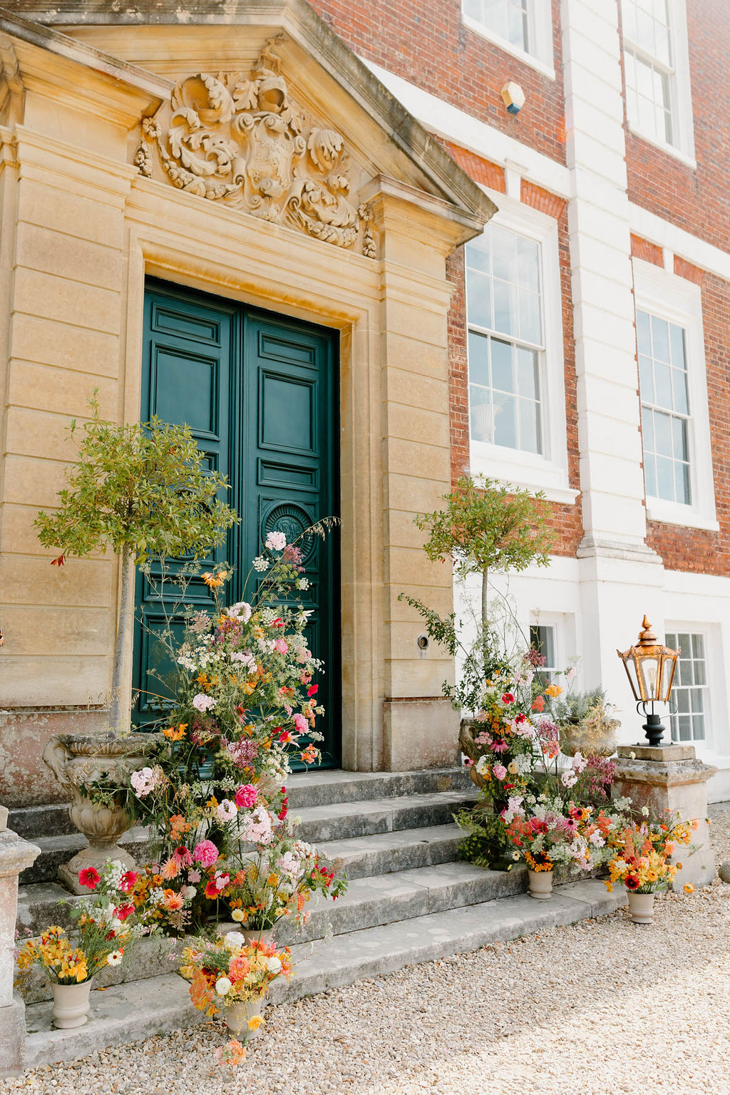 Entrance Doorway Flower Pillar Arrangement Pink Orange Yellow Wedding Ideas Mimosa Photography