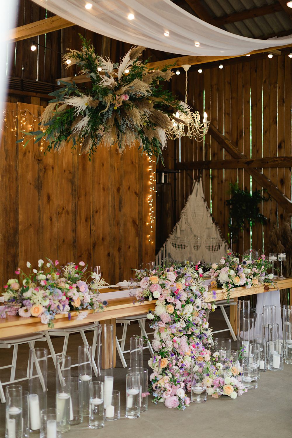 Decor Table Flowers Pink Candles Fairy Lights Poland Barn Wedding Matt and Lena Photography