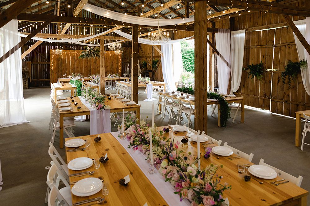 Decor Table Flowers Pink Candles Fairy Lights Poland Barn Wedding Matt and Lena Photography