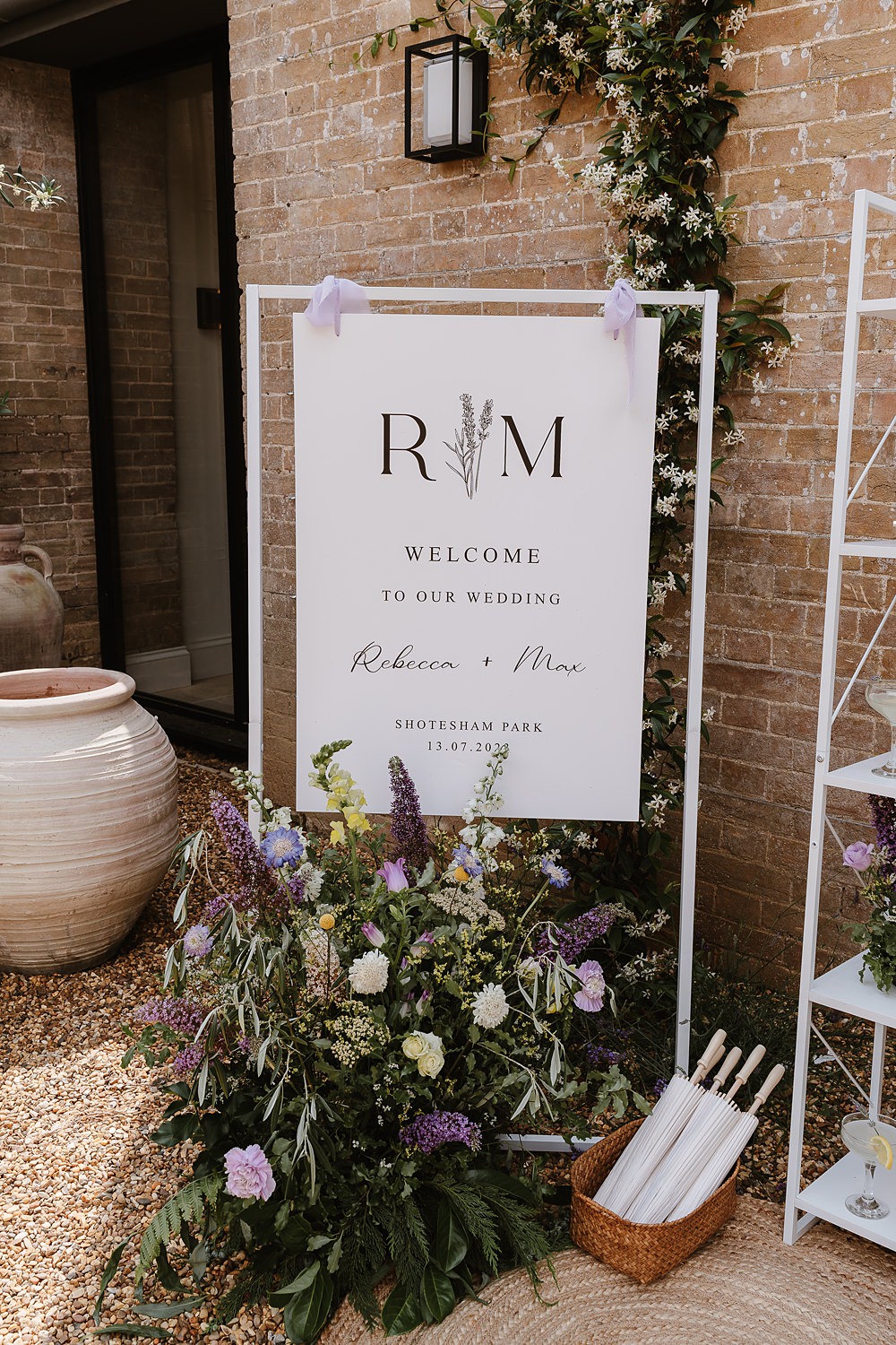 Parasols Welcome Sign Flowers Shotesham Park Wedding By Emma Olivia Photography
