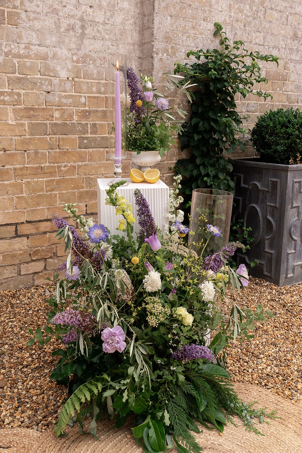 White Pillars Flowers Candles Ceremony Decor Yellow Lilac Shotesham Park Wedding By Emma Olivia Photography