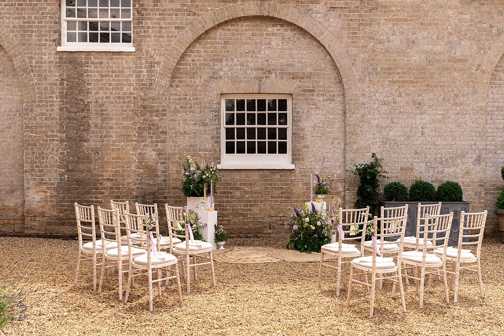 White Pillars Flowers Candles Ceremony Decor Yellow Lilac Shotesham Park Wedding By Emma Olivia Photography