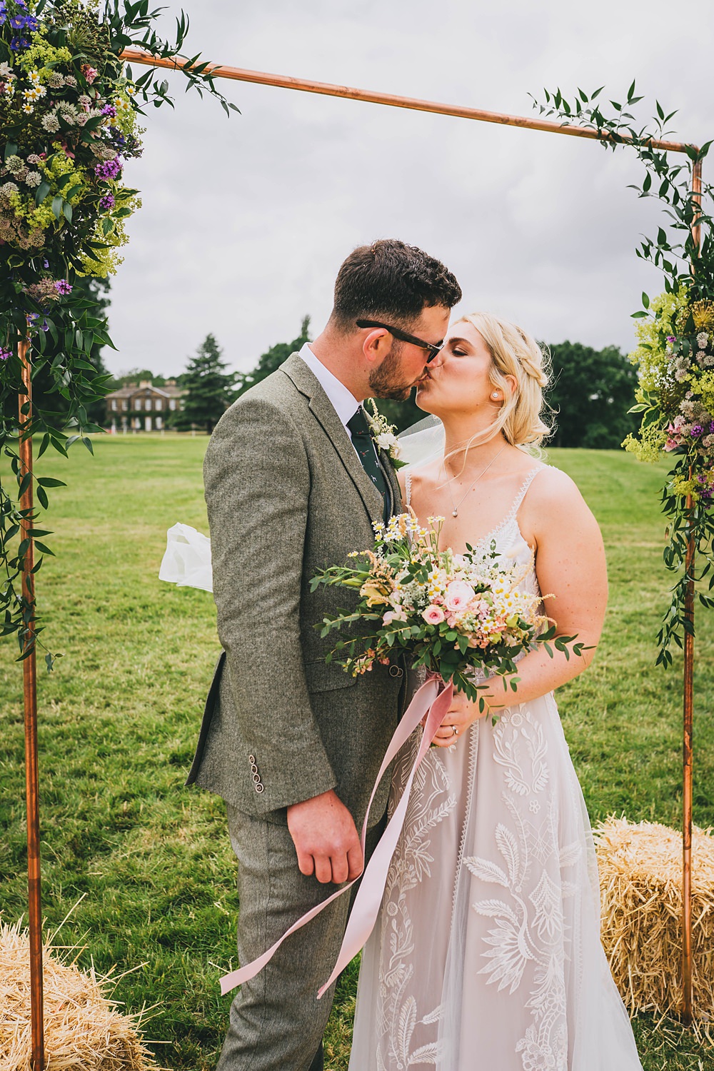 South Yorkshire Farm Wedding Amy Jordison Photography Copper Pipe Arch Frame Backdrop Flowers