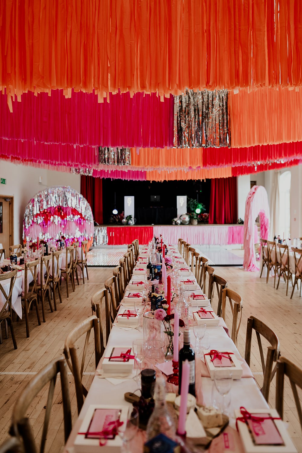 70s Disco Wedding Bubear Photography Village Hall Streamers Decor Pink Red