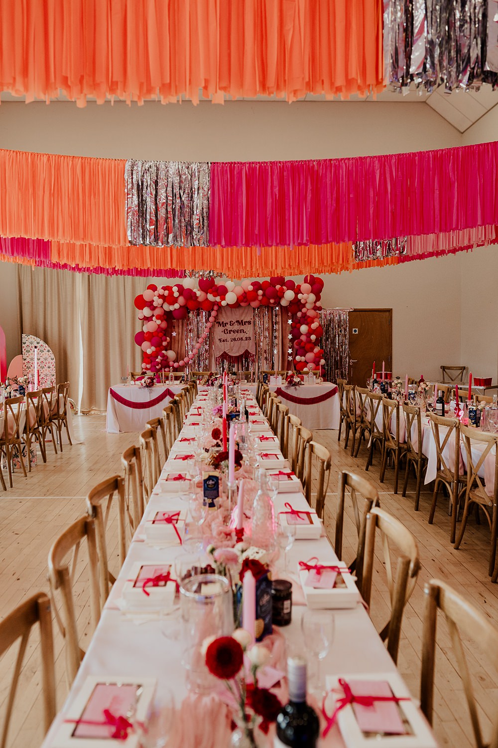 70s Disco Wedding Bubear Photography Village Hall Streamers Decor Pink Red