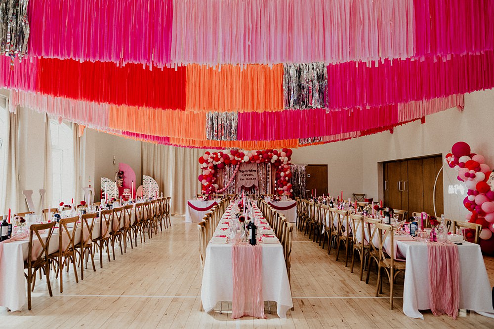 70s Disco Wedding Bubear Photography Village Hall Streamers Decor Pink Red